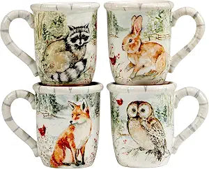 Winters Walk Set of 4 Ceramic Mugs Enjoy hot cocoa, tea, or coffee in these delightful 16oz mugs adorned with foxes, owls, and raccoons, adding a touch of winter wonder to your mornings