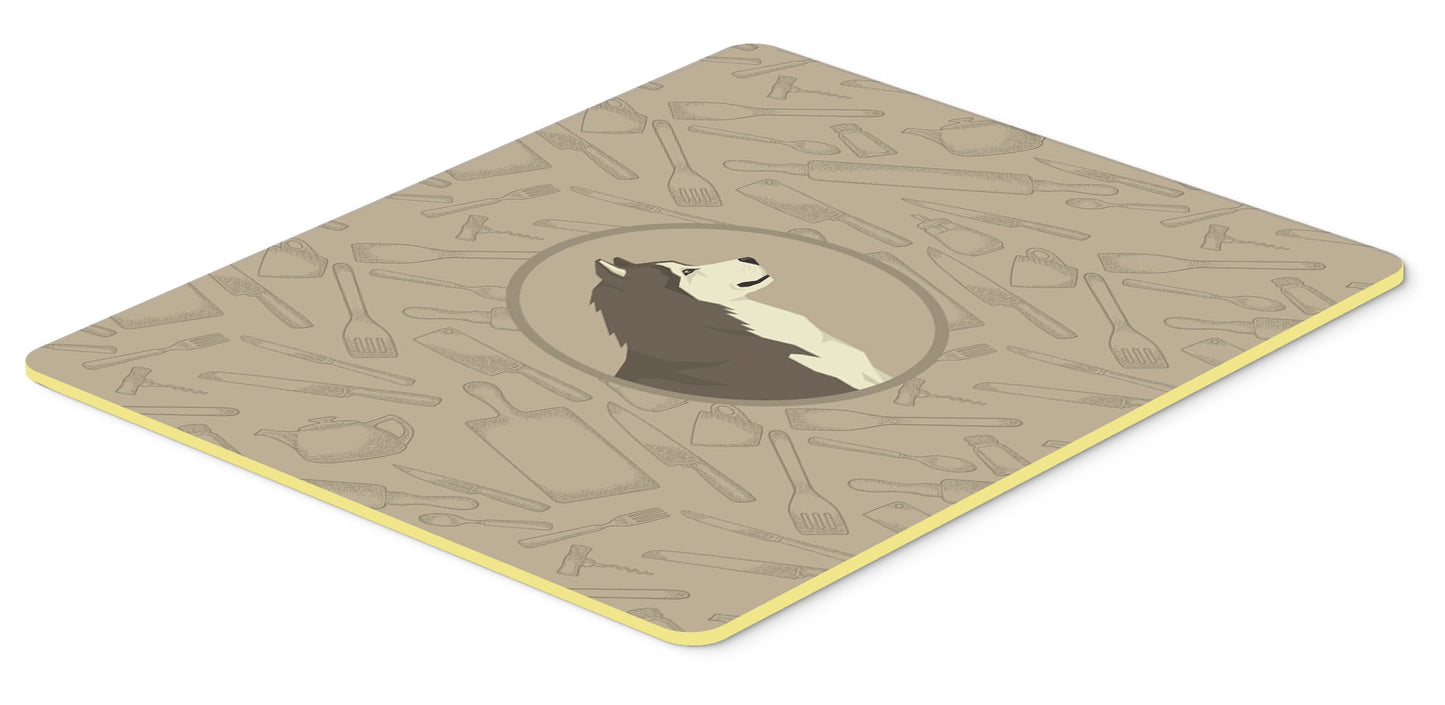 Alaskan Malamute In the Kitchen Kitchen or Bath Mat 24x36