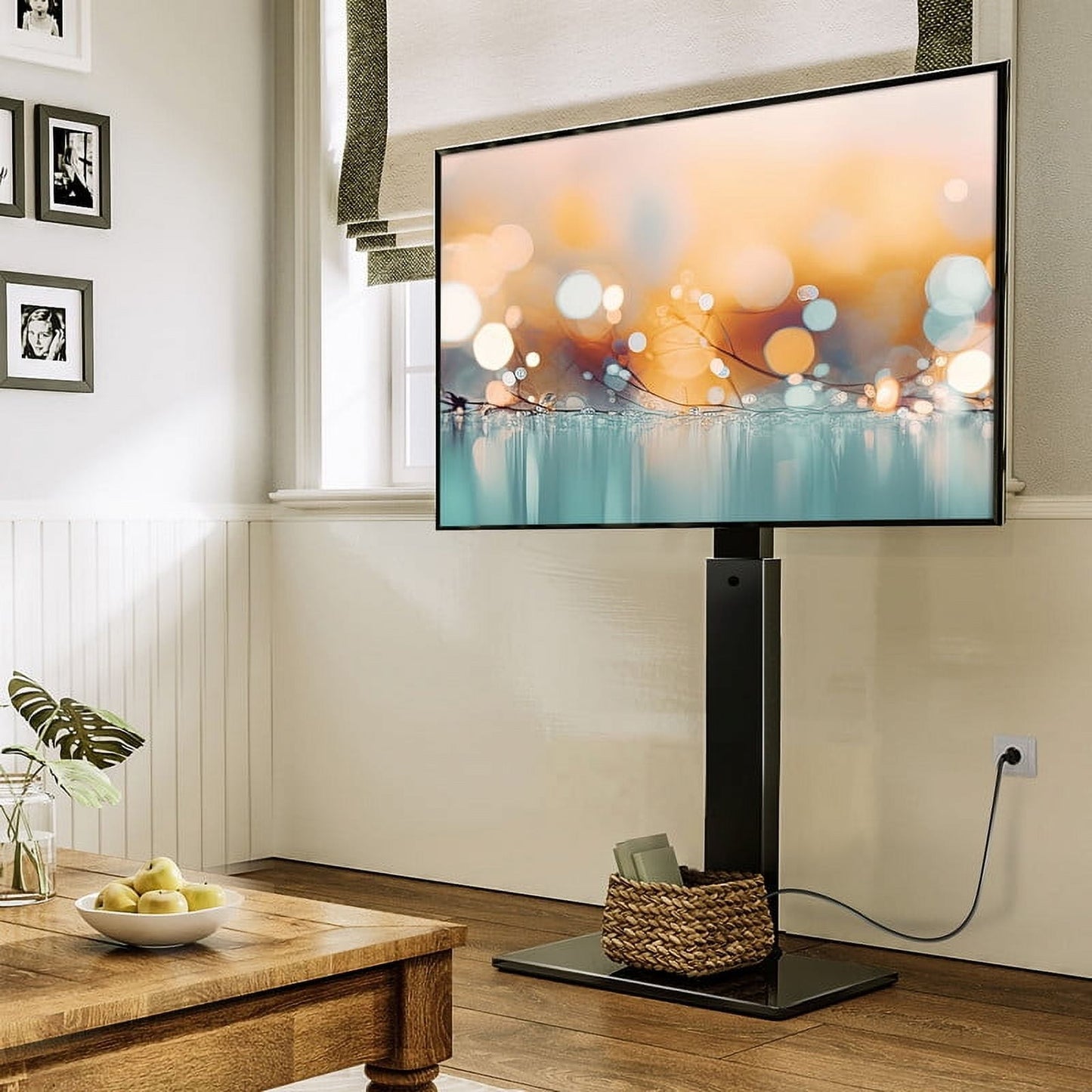 FITUEYES Modern Black Swivel Floor TV Stand with Power Strip for TVs up to 70 inch Metal Base