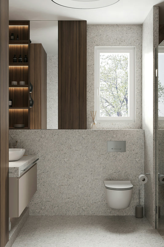 a bathroom with a toilet and sink