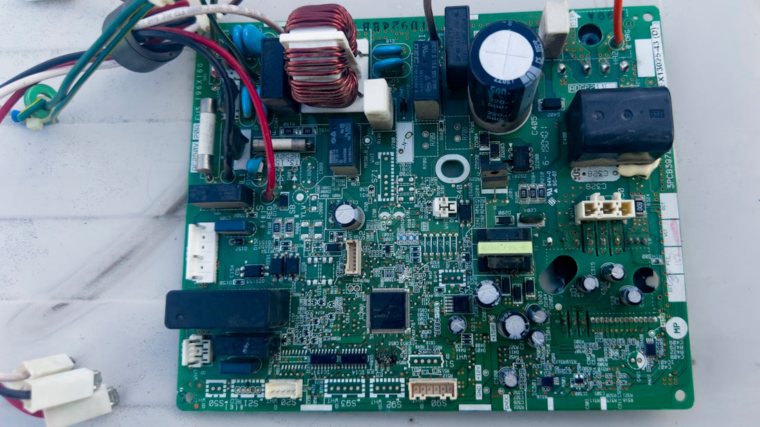 A circuit board with wires and wires attached to it