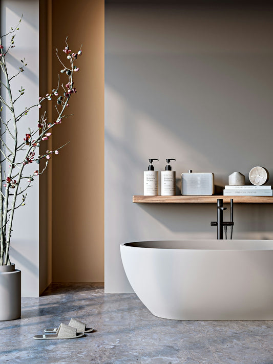 Elegant bathroom with modern fixtures and decor.