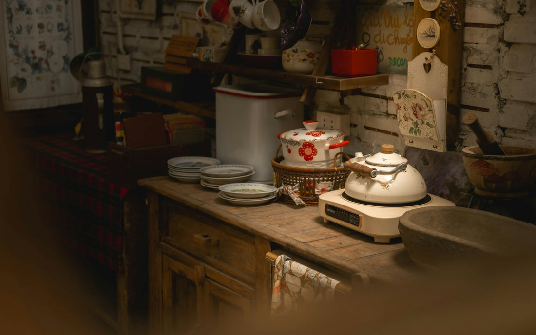 Rustic kitchen counter with kettle and dishes