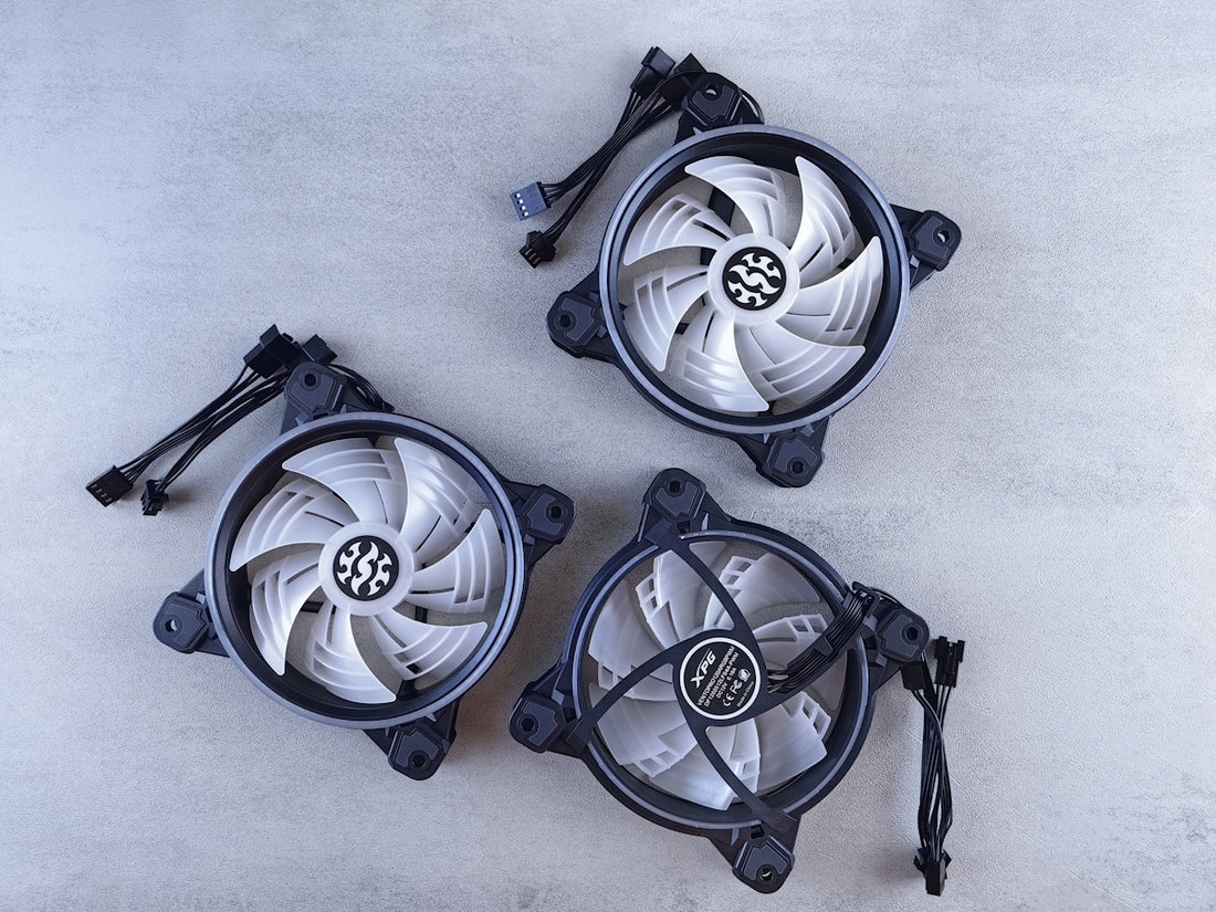 Three computer cooling fans arranged on a surface