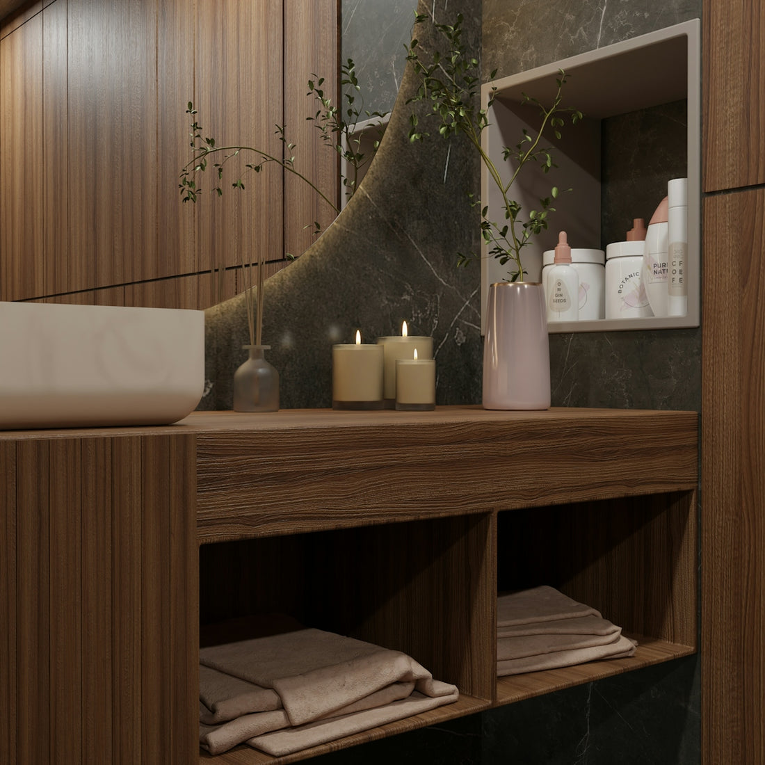 Modern bathroom vanity with candles and toiletries.