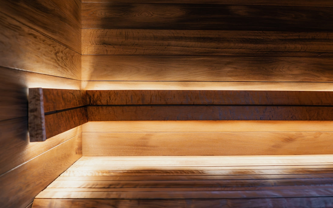 Warm wooden sauna interior with ambient lighting
