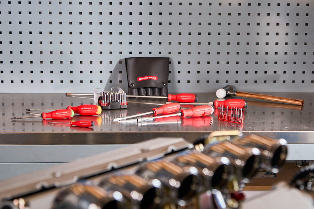 Various tools laid out on a workbench