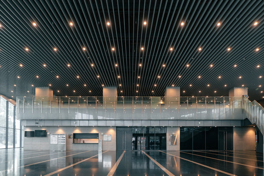 Modern interior with reflective floors and ceiling lights