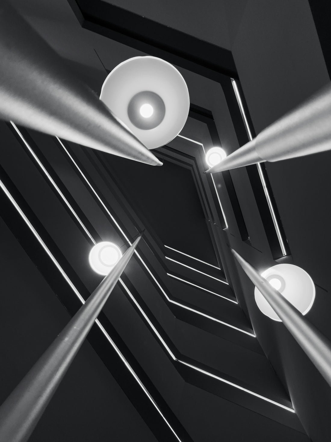 Modern architecture with dramatic lighting and sharp angles.