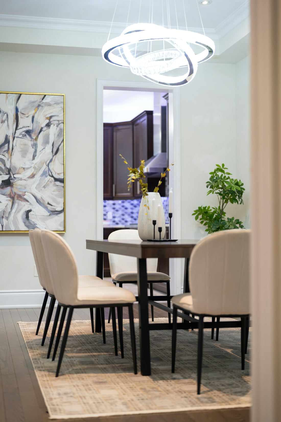 A modern dining room with a table and chairs