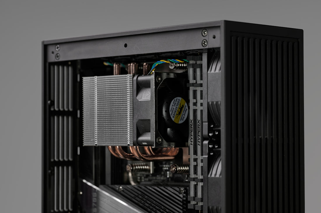 Inside a black computer case with cooling system