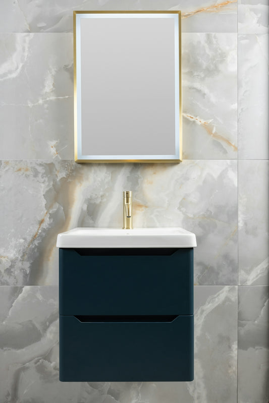 Modern bathroom vanity with gold accents and marble tile wall.
