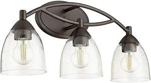 Quorum International Barkley 3-Light Vanity Light | Made of Steel | Oiled Bronze Finish | Clear Seeded Glass | Transitional Tube Frame Design | Curved Arms | Damp Rated | 21" W x 9.75" H | 5069-3-286