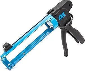OX Pro Compact Caulk Gun - 10 oz Rodless Manual Caulking Gun Tool - 7:1 Thrust Ratio Designed for Tight Spaces, Includes Belt Clip - Pistola De Silicona