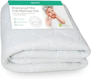 Newton Baby Waterproof MINI Crib Mattress Pad | Ultra-Breathable Quilted Layer for Comfort & Universal Fitted Skirt for Secure Fit | Machine Washable | MINI Crib Mattress Protector Pad, 1 Pack