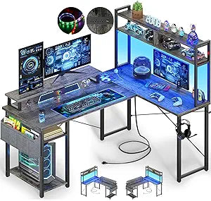 Besiost Small L Shaped Gaming Desk with Power Outlets, 48" Reversible L Shaped LED Computer Desk with Monitor Stand & Storage Shelf, Corner Gamer Desk Home Office Desk with Storage Bag, Black Oak