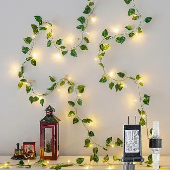 Vine String Lights Plug in, 23FT 73 LED Vines with Fairy Lights, Faux Pothos Leaf Garland with Light for Bedroom, Dorm Room, Wedding, Party & Home Decor, Warm White